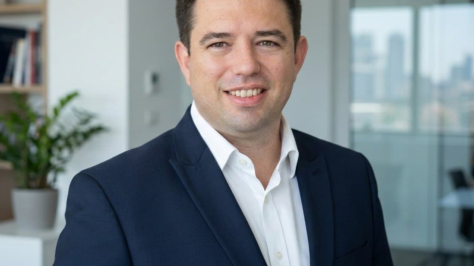 A portrait of Olivier Pages, COO of CMB Monaco, in an office setting.
